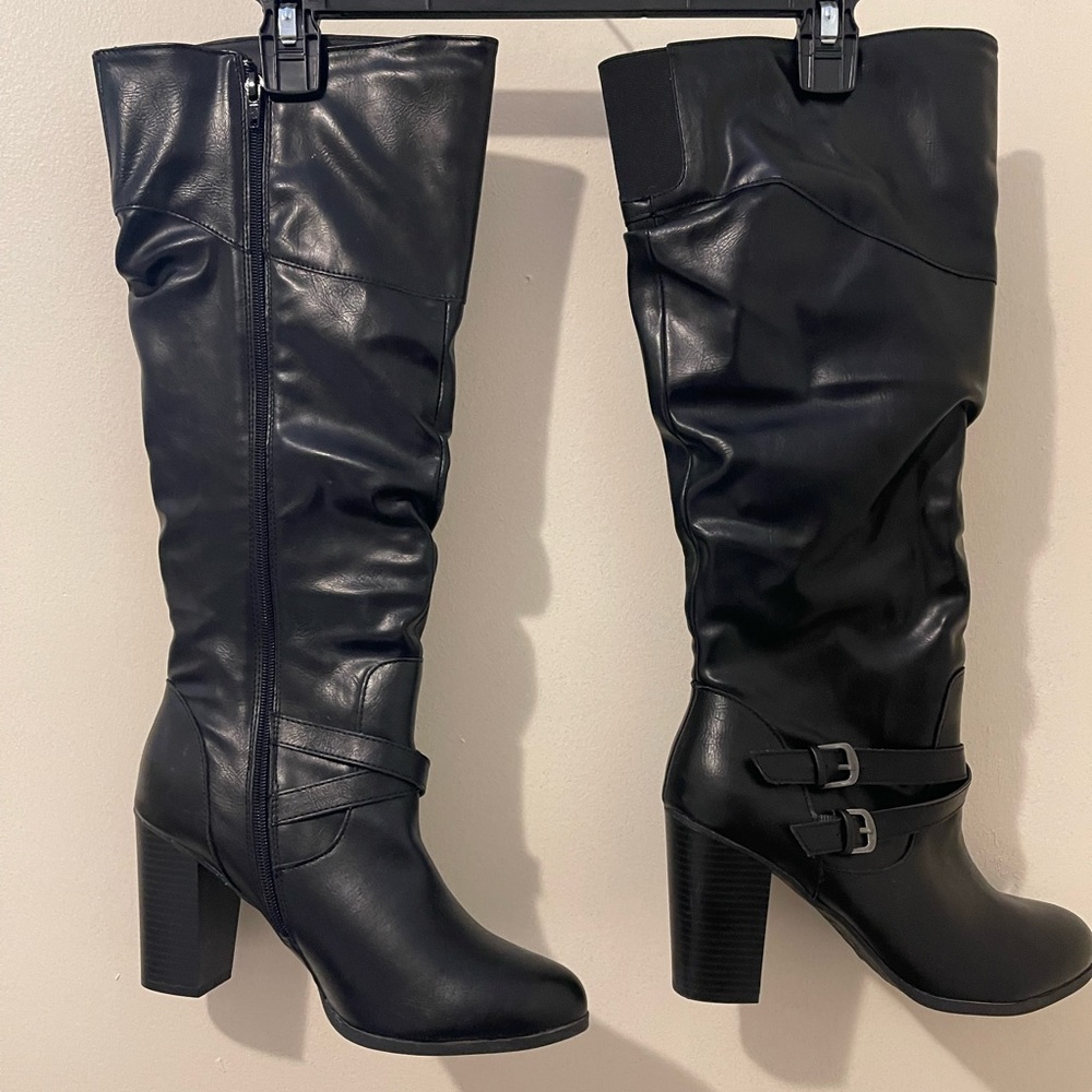 Nice pair of comfortable black high heeled boots